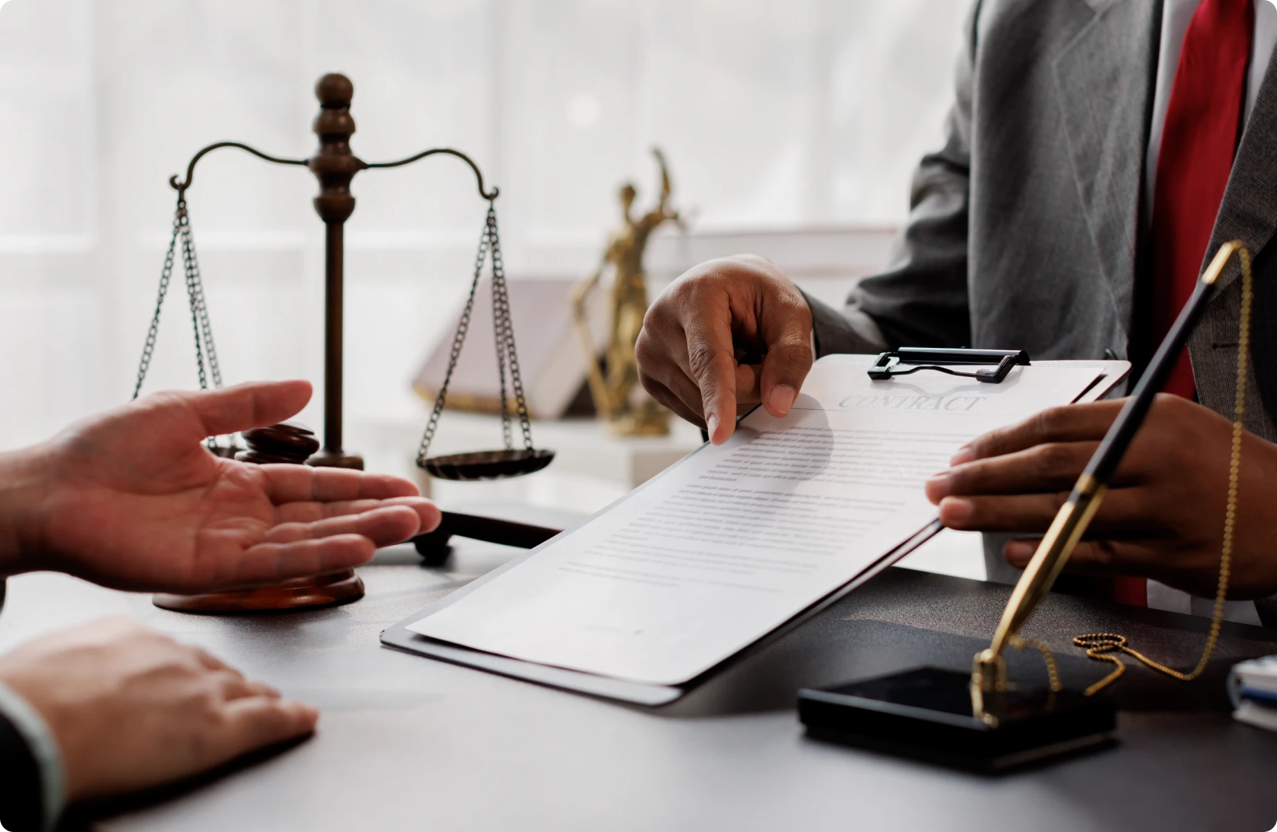 Signing documents during legal meeting