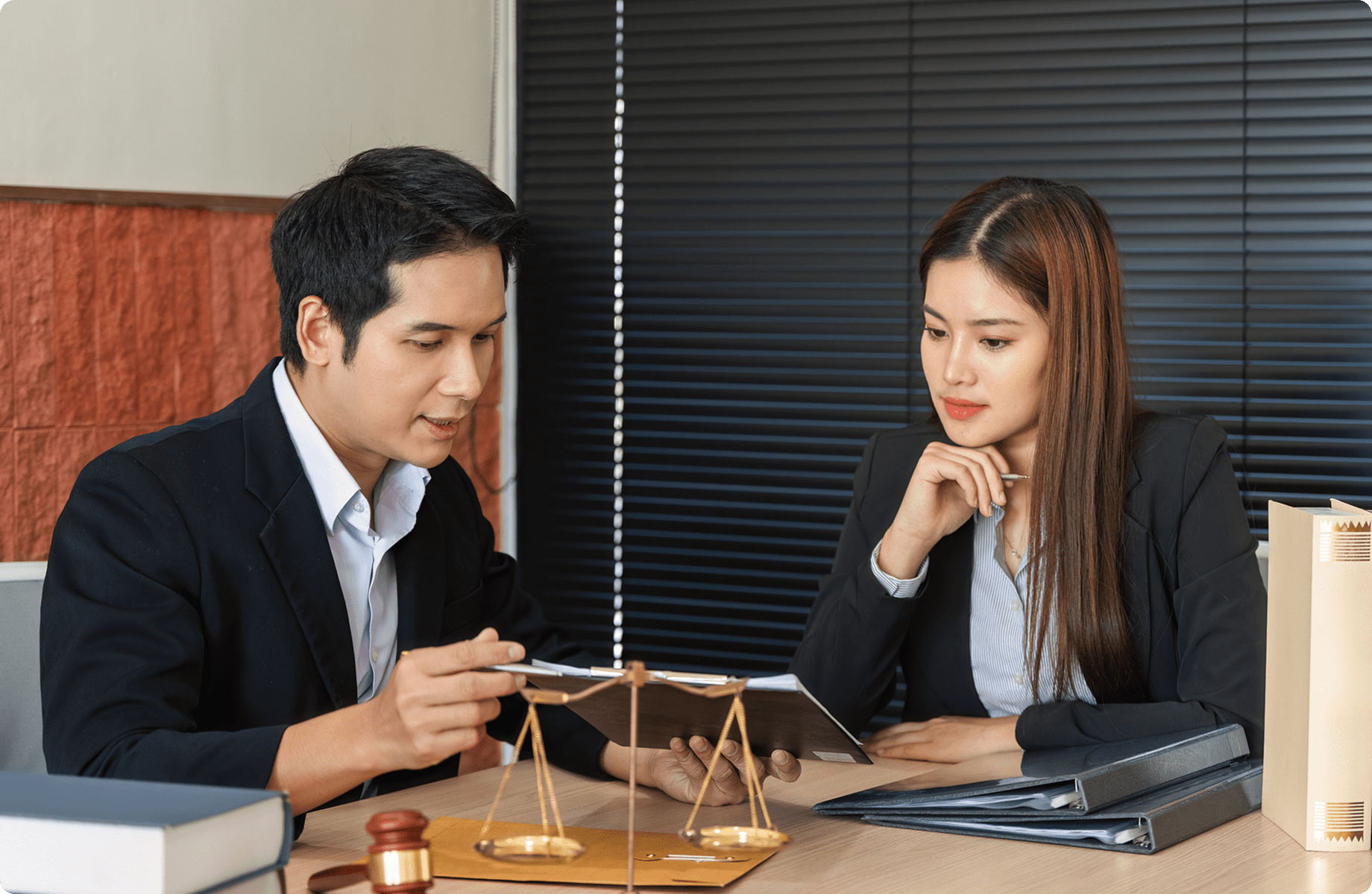 Business meeting with scale and gavel