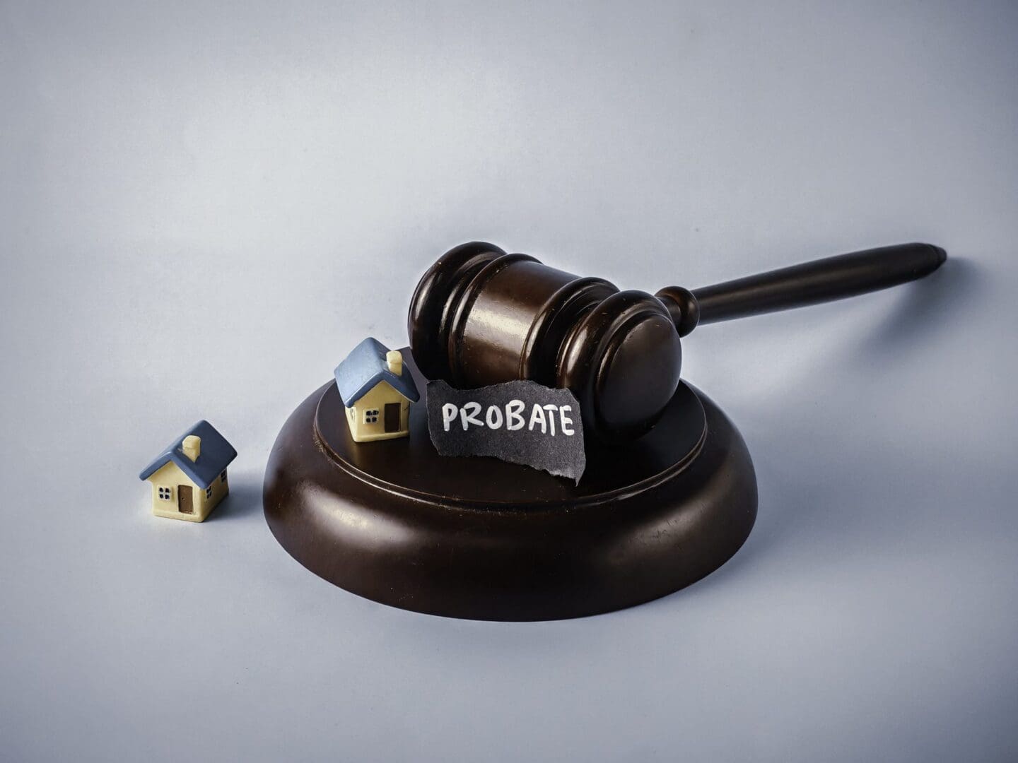 Legal gavel, probate, miniature houses