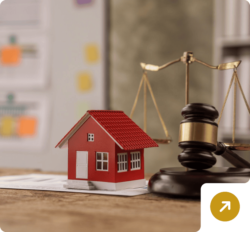 Model house beside legal gavel
