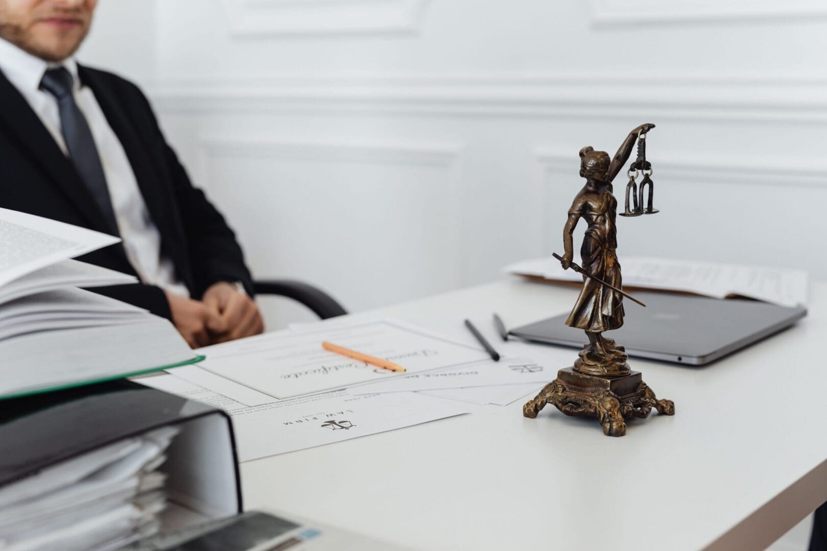 Office desk with justice figurine