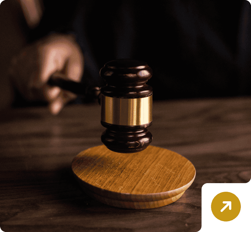 Judge's gavel on wooden desk